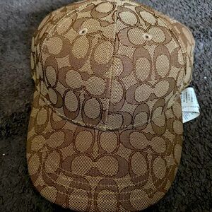 Tan coach hat